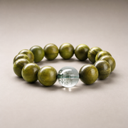 Three-quarter view of green sandalwood and green phantom bracelet