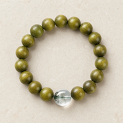 Top view of 10 mm green sandalwood and green phantom bracelet